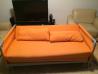 Raztegljiv kavč v oranžni barvi-ODDANO!