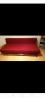 Rdeča sedežna ki se raztegne v spalno ležišče, zelo lepo ohranjen