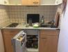 Kuhinja 1,5m s podpultnim hladilnikom, el. štedilnikom in koritom