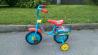 Otroško kolo s pomožnima kolesoma
