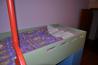 Otroška postelja z omarama in stopnicami